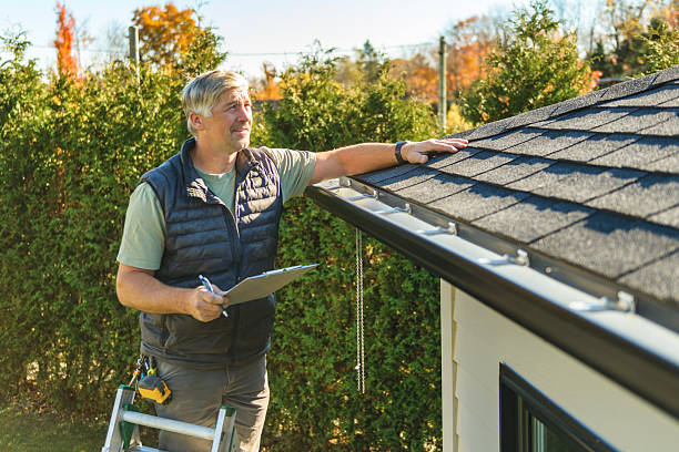 Professional Storm Damage Roof Repair technician working in Willis, TX